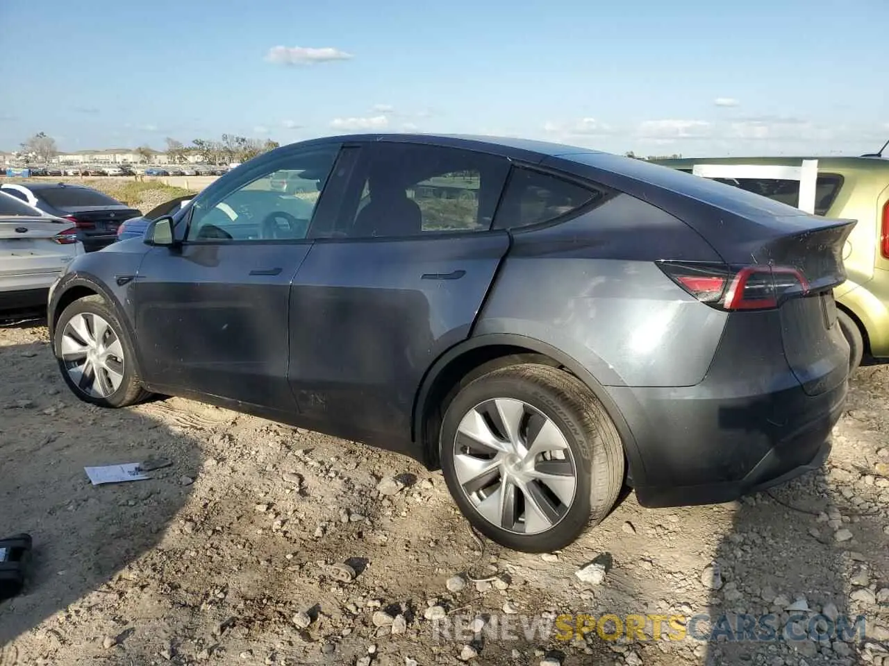 2 fotografías del automóvil dañado 7SAYGDEE1PA211410 TESLA MODEL Y 2023