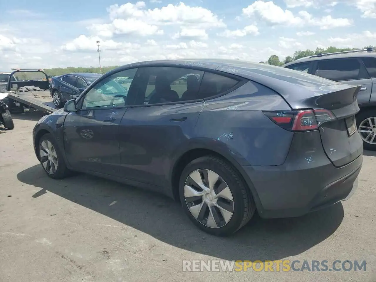 2 fotografías del automóvil dañado 7SAYGDEE1PF612166 TESLA MODEL Y 2023