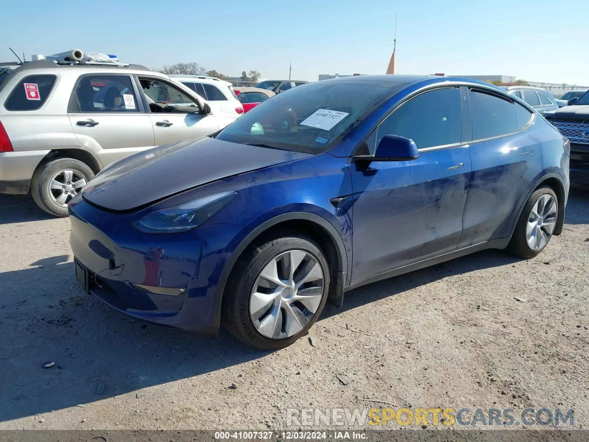 2 fotografías del automóvil dañado 7SAYGDEE1PF635916 TESLA MODEL Y 2023