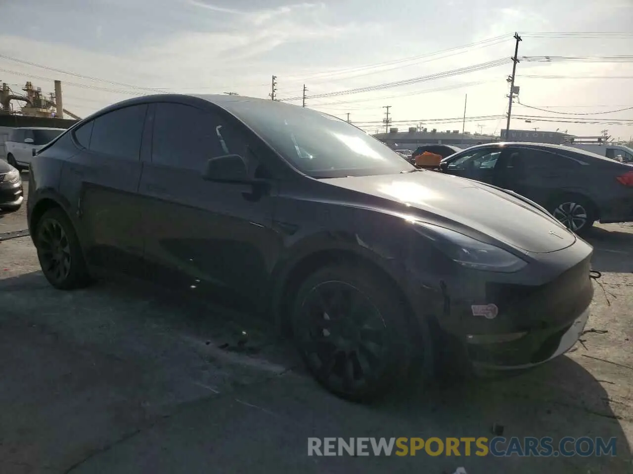 4 fotografías del automóvil dañado 7SAYGDEE1PF881834 TESLA MODEL Y 2023