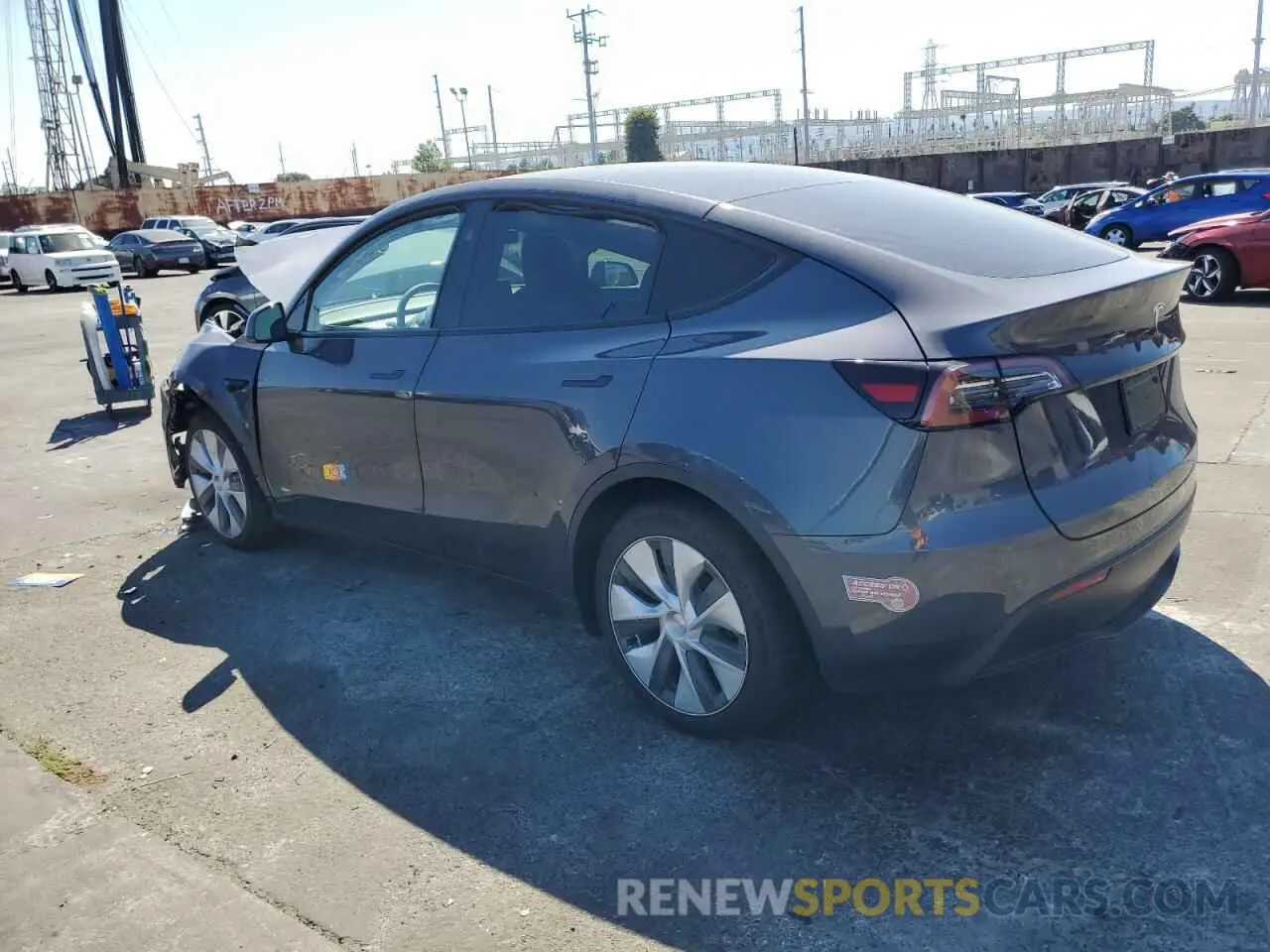 2 fotografías del automóvil dañado 7SAYGDEE1PF906926 TESLA MODEL Y 2023