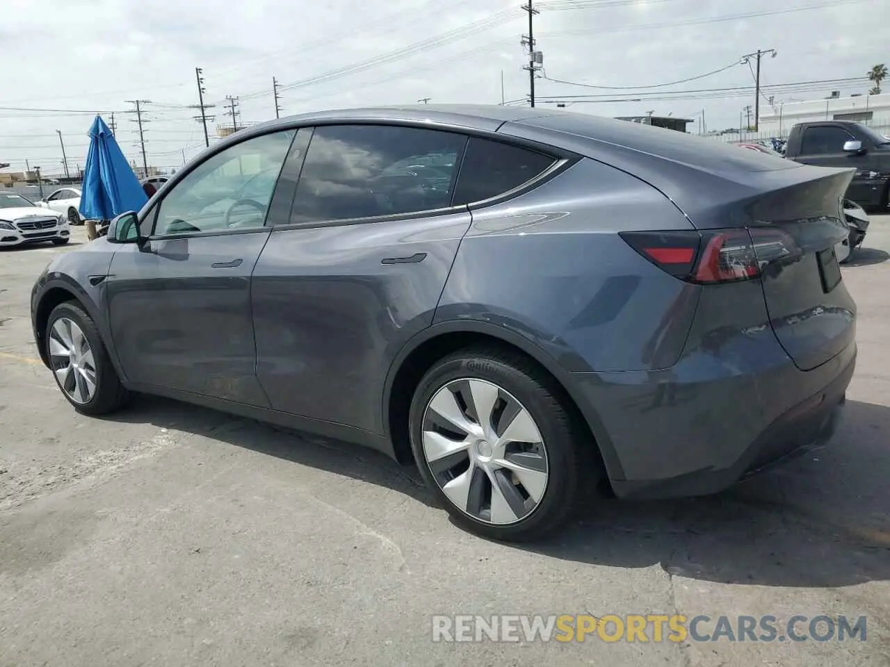 2 fotografías del automóvil dañado 7SAYGDEE1PF912600 TESLA MODEL Y 2023