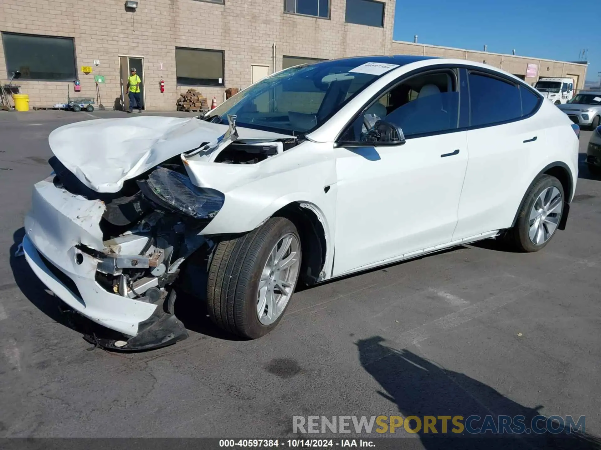 2 fotografías del automóvil dañado 7SAYGDEE1PF920924 TESLA MODEL Y 2023