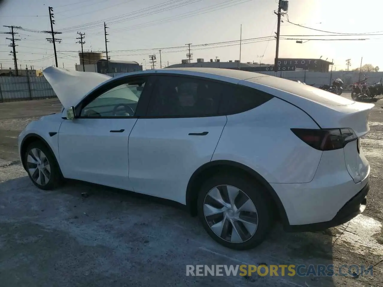2 fotografías del automóvil dañado 7SAYGDEE2PA063039 TESLA MODEL Y 2023