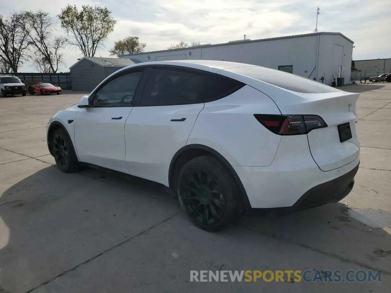 2 fotografías del automóvil dañado 7SAYGDEE2PA065048 TESLA MODEL Y 2023