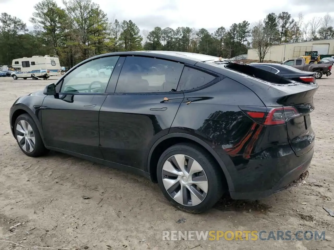 2 fotografías del automóvil dañado 7SAYGDEE2PA103555 TESLA MODEL Y 2023