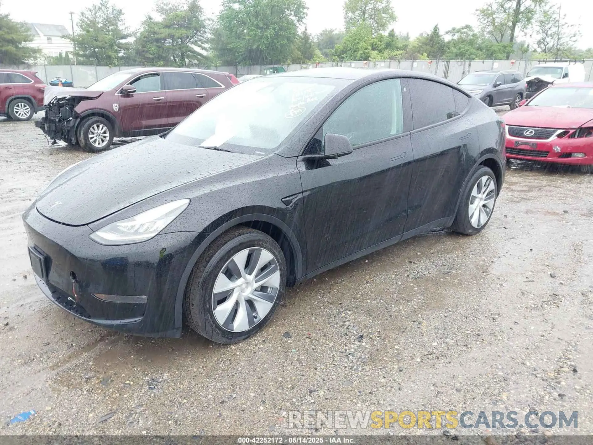 2 fotografías del automóvil dañado 7SAYGDEE2PA105631 TESLA MODEL Y 2023