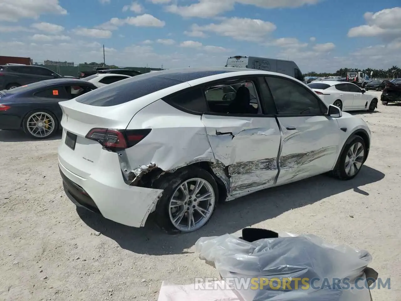 3 fotografías del automóvil dañado 7SAYGDEE2PF604318 TESLA MODEL Y 2023