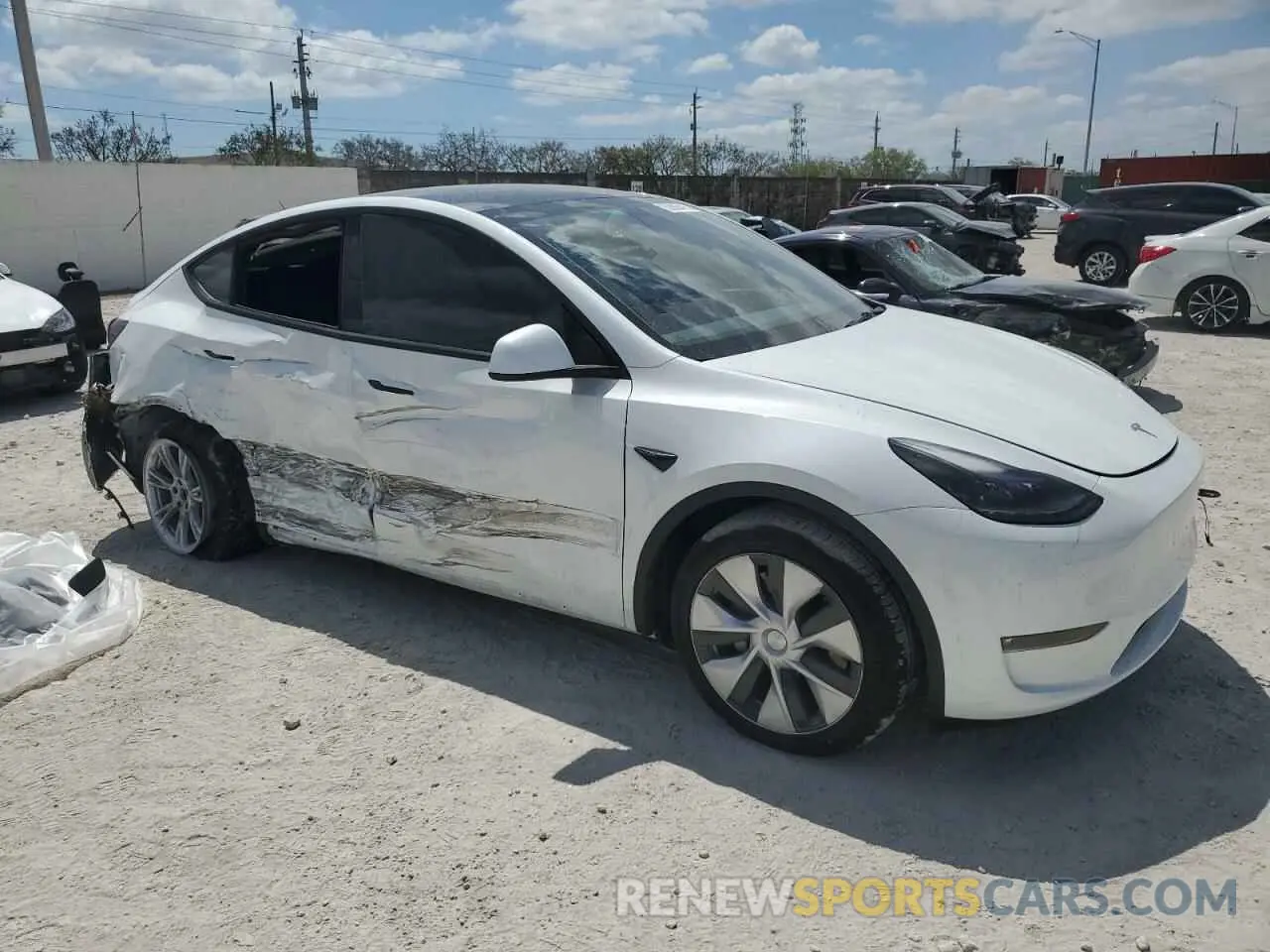 4 fotografías del automóvil dañado 7SAYGDEE2PF604318 TESLA MODEL Y 2023