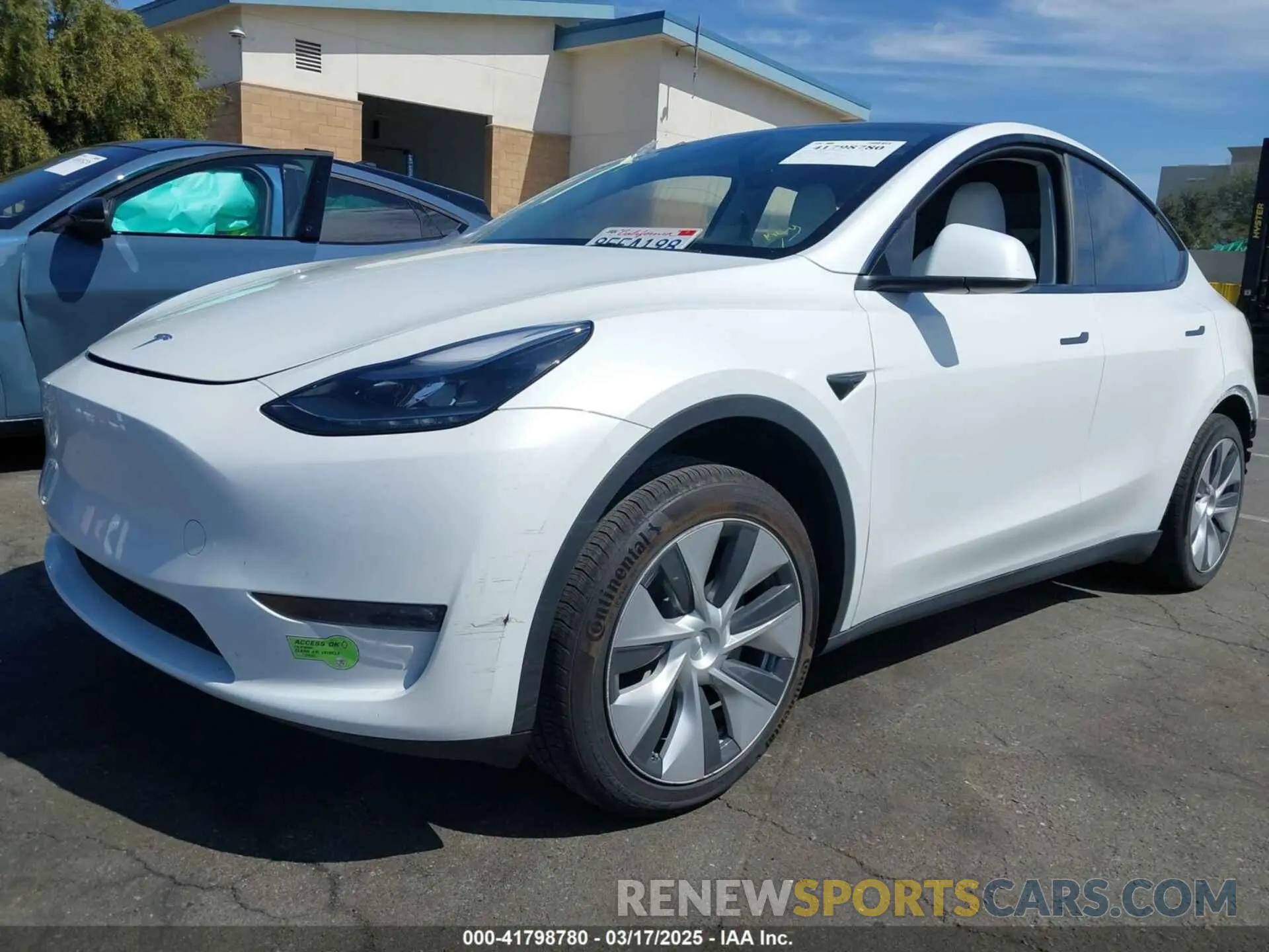 2 fotografías del automóvil dañado 7SAYGDEE2PF632121 TESLA MODEL Y 2023