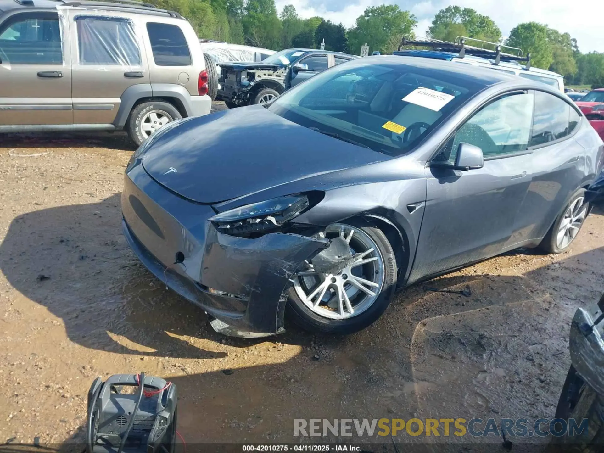 2 fotografías del automóvil dañado 7SAYGDEE2PF674286 TESLA MODEL Y 2023