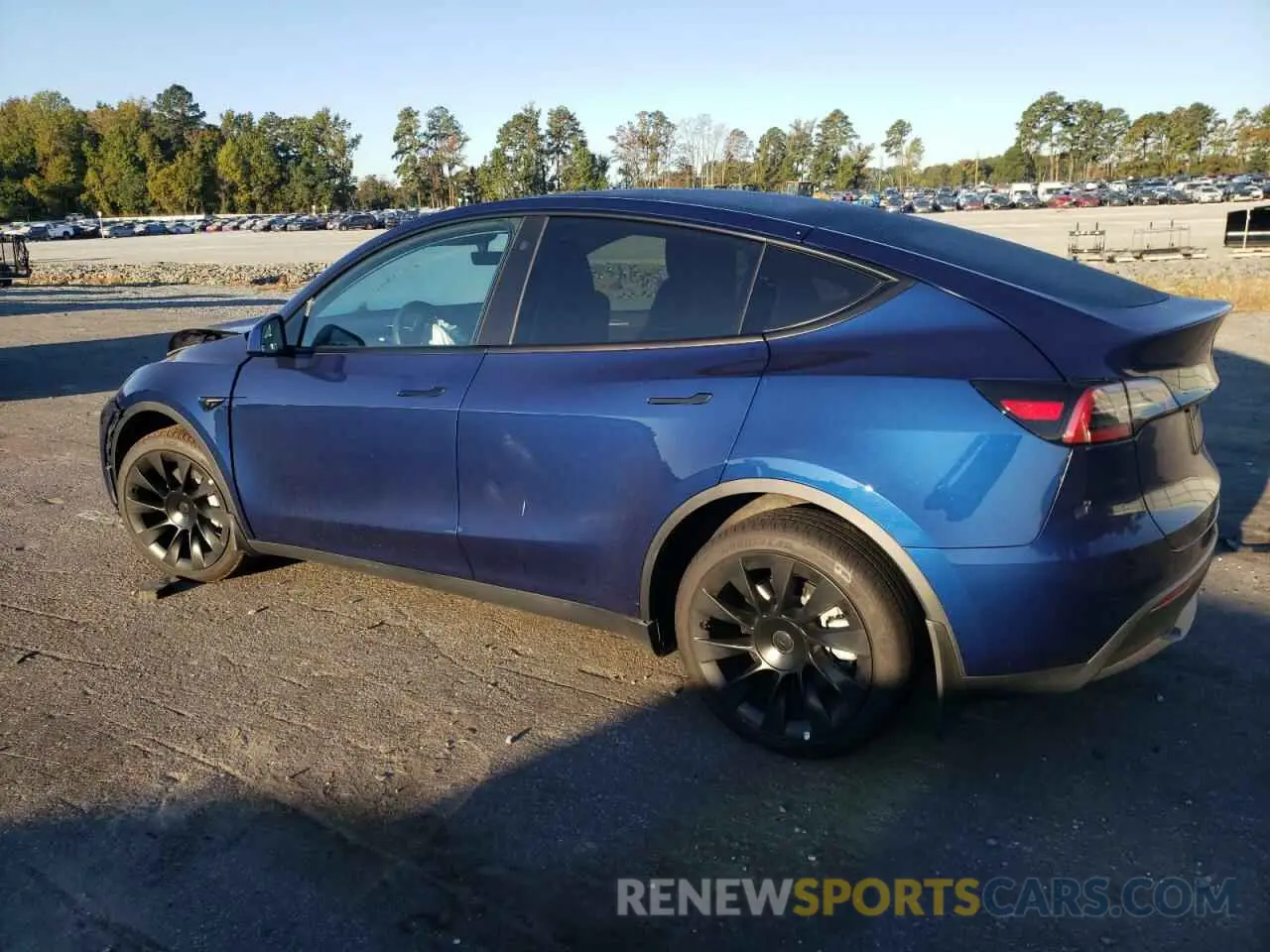 2 fotografías del automóvil dañado 7SAYGDEE2PF688592 TESLA MODEL Y 2023