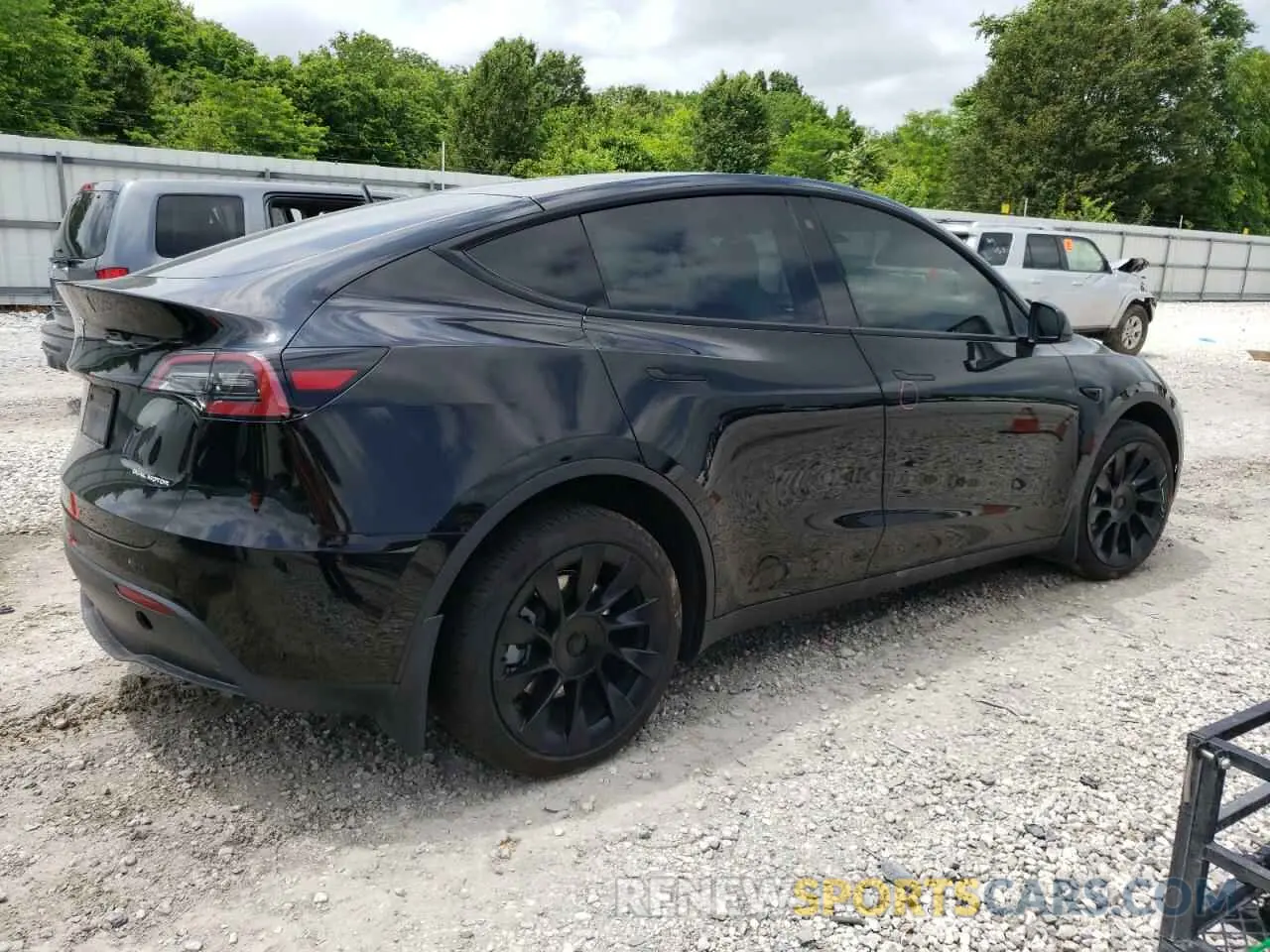 3 fotografías del automóvil dañado 7SAYGDEE2PF750444 TESLA MODEL Y 2023