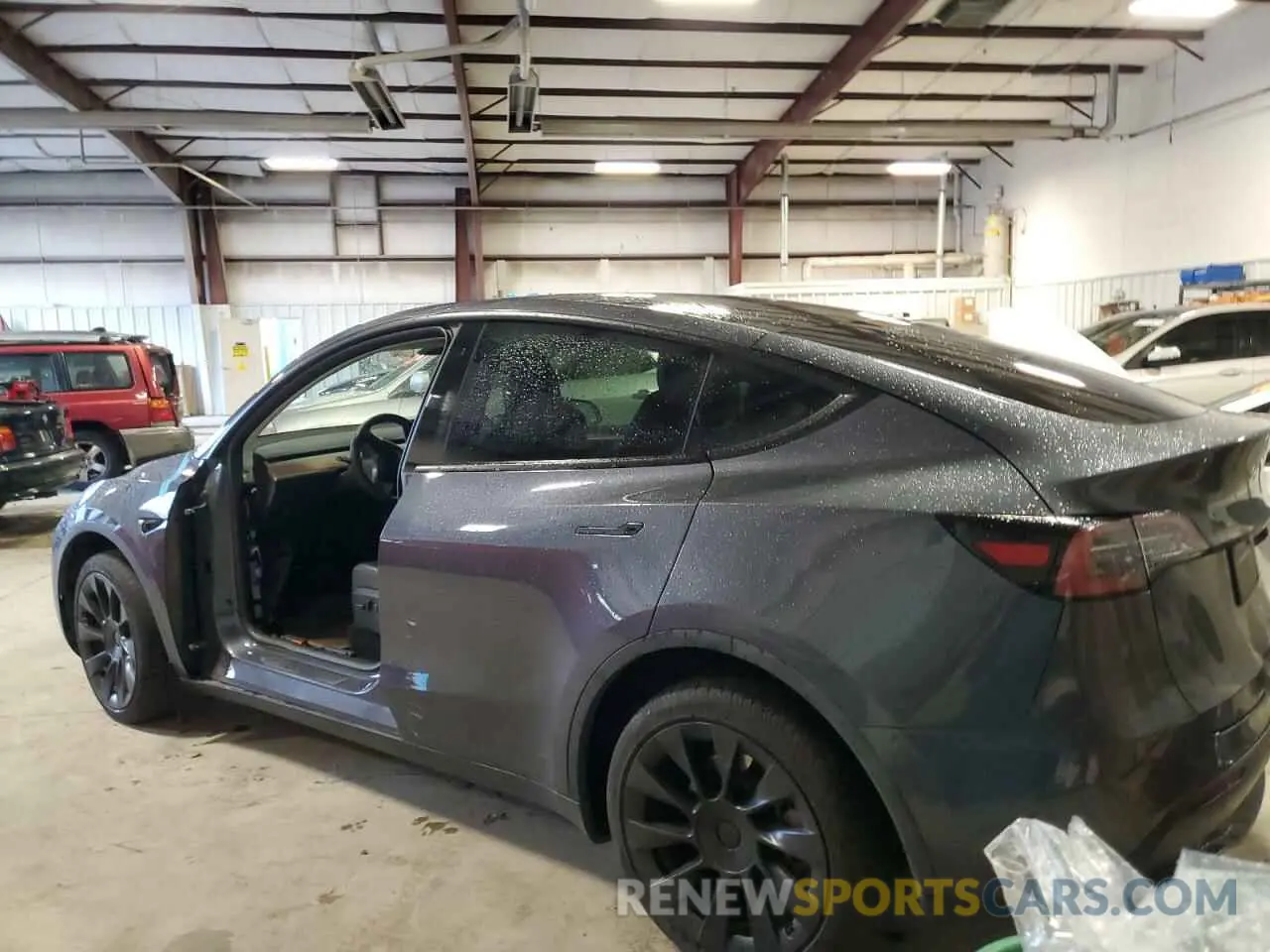 2 fotografías del automóvil dañado 7SAYGDEE2PF765784 TESLA MODEL Y 2023