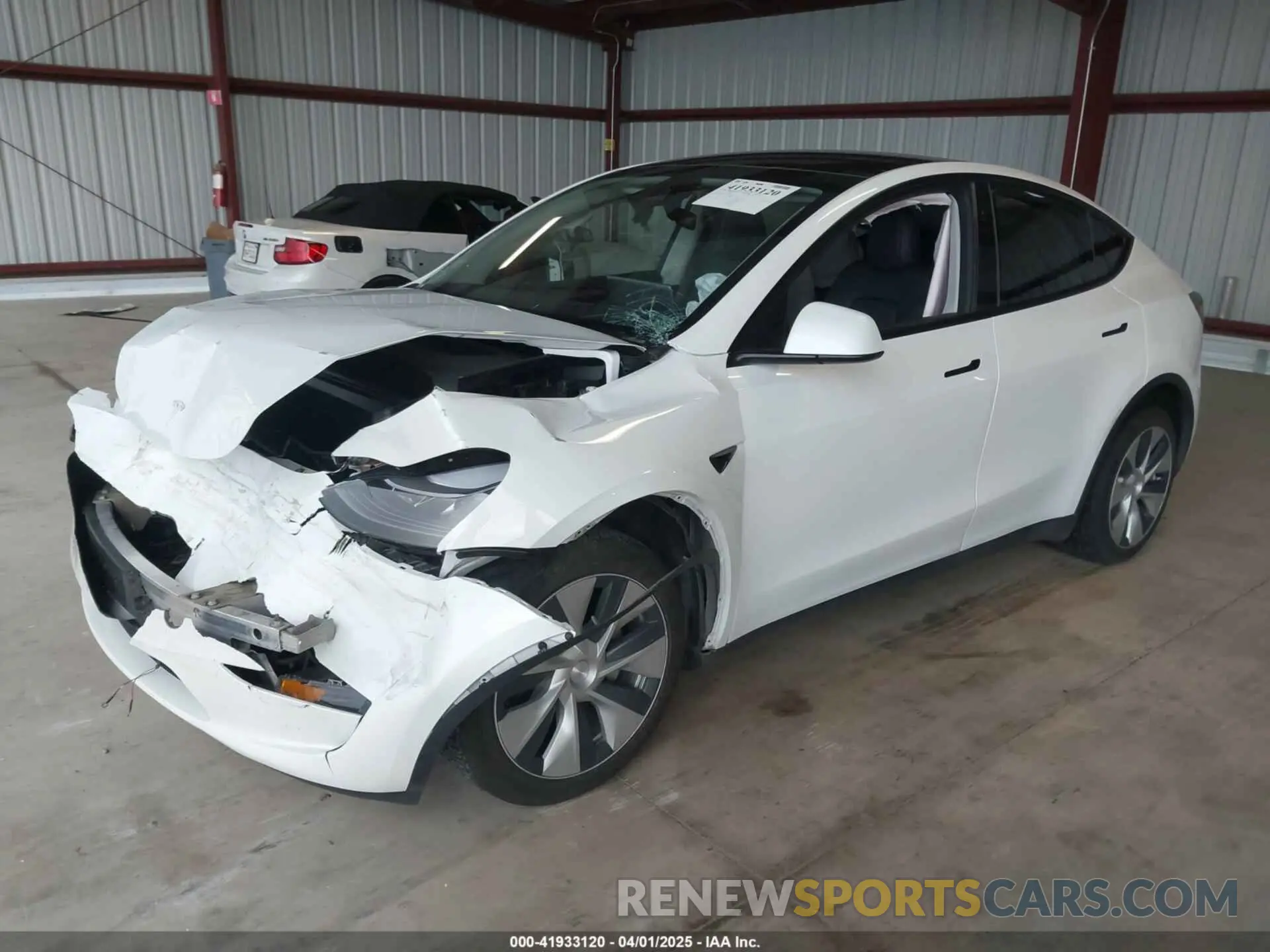 2 fotografías del automóvil dañado 7SAYGDEE2PF834036 TESLA MODEL Y 2023