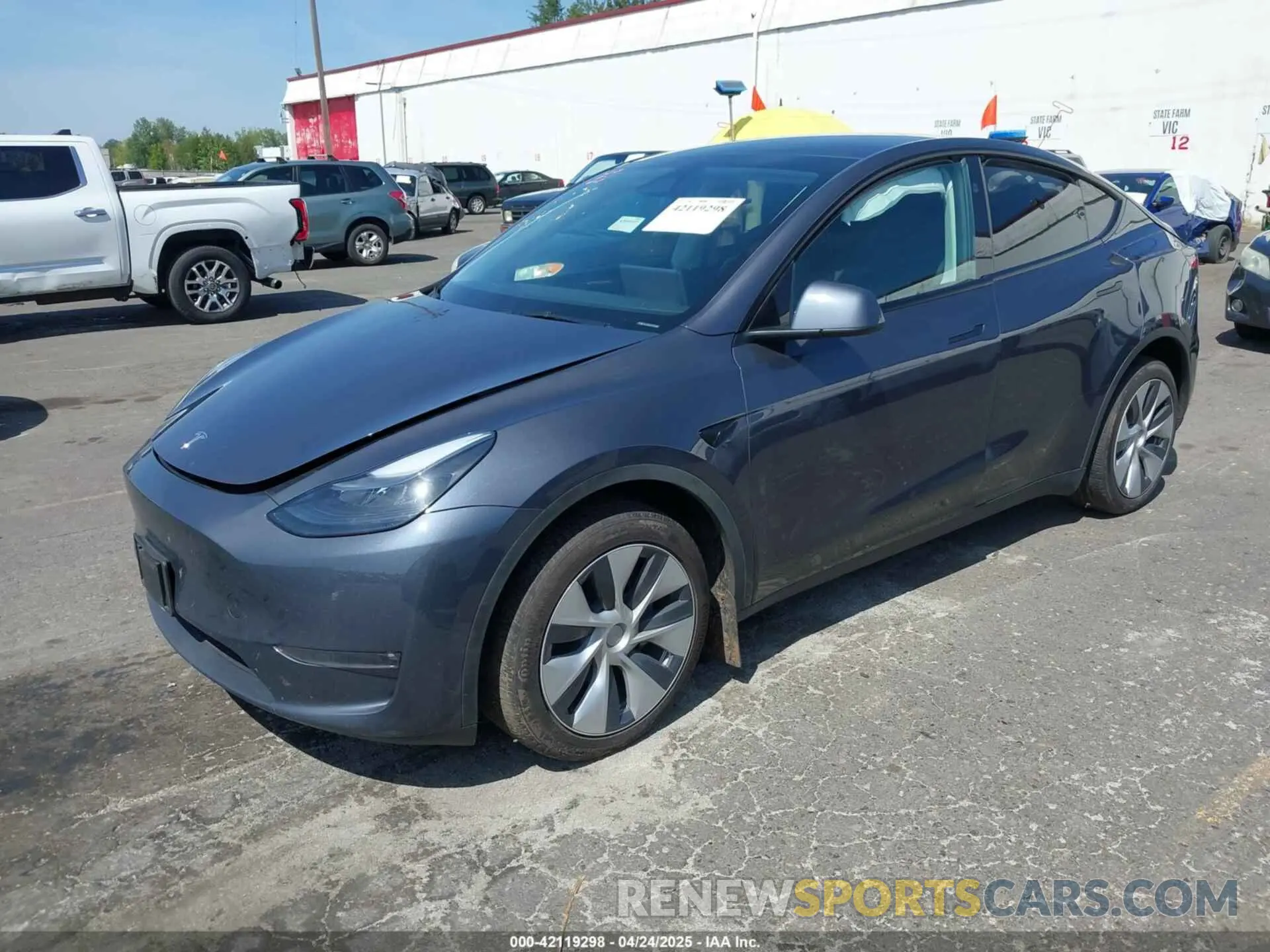 2 fotografías del automóvil dañado 7SAYGDEE2PF839866 TESLA MODEL Y 2023