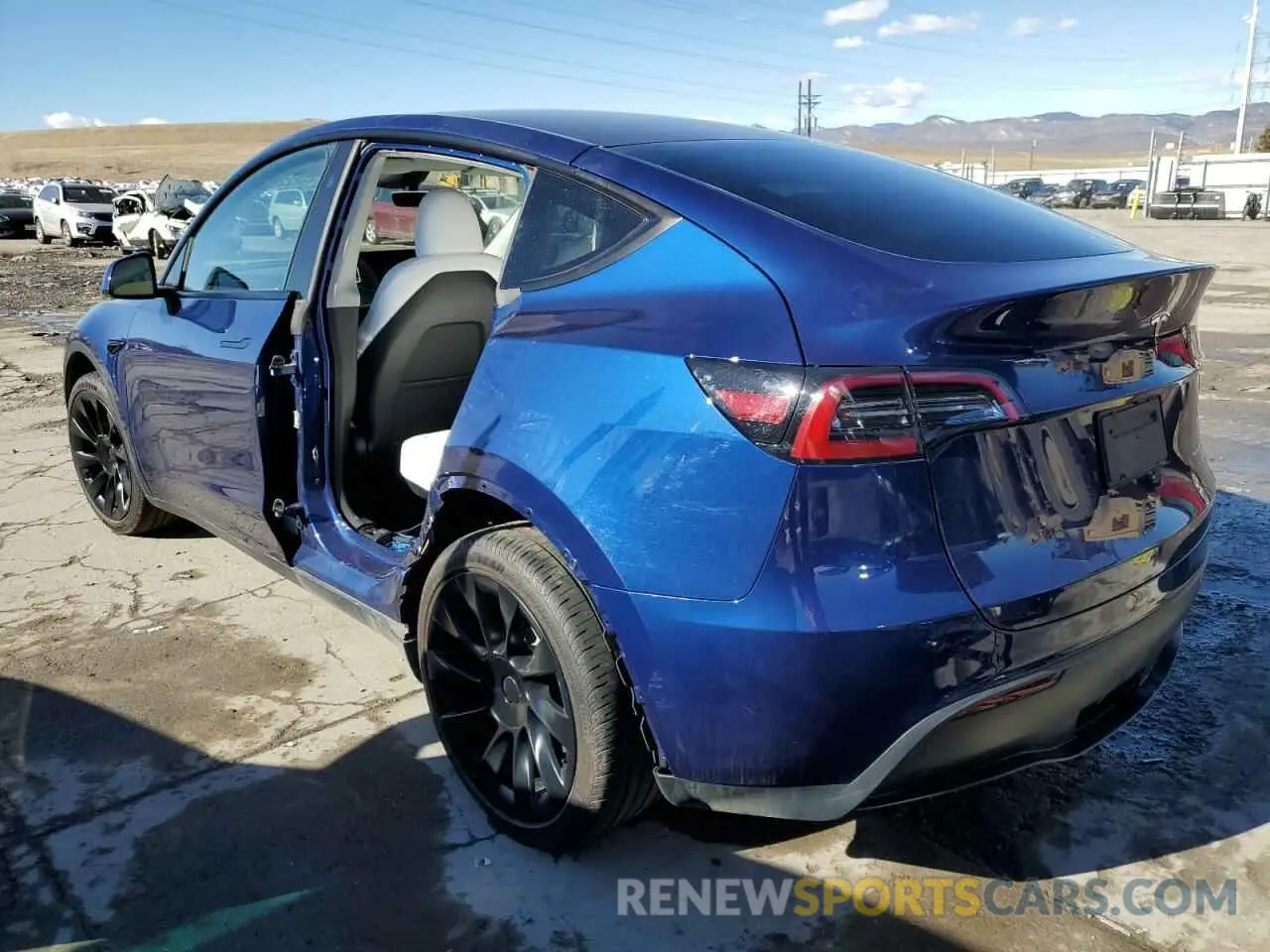 2 fotografías del automóvil dañado 7SAYGDEE2PF872902 TESLA MODEL Y 2023
