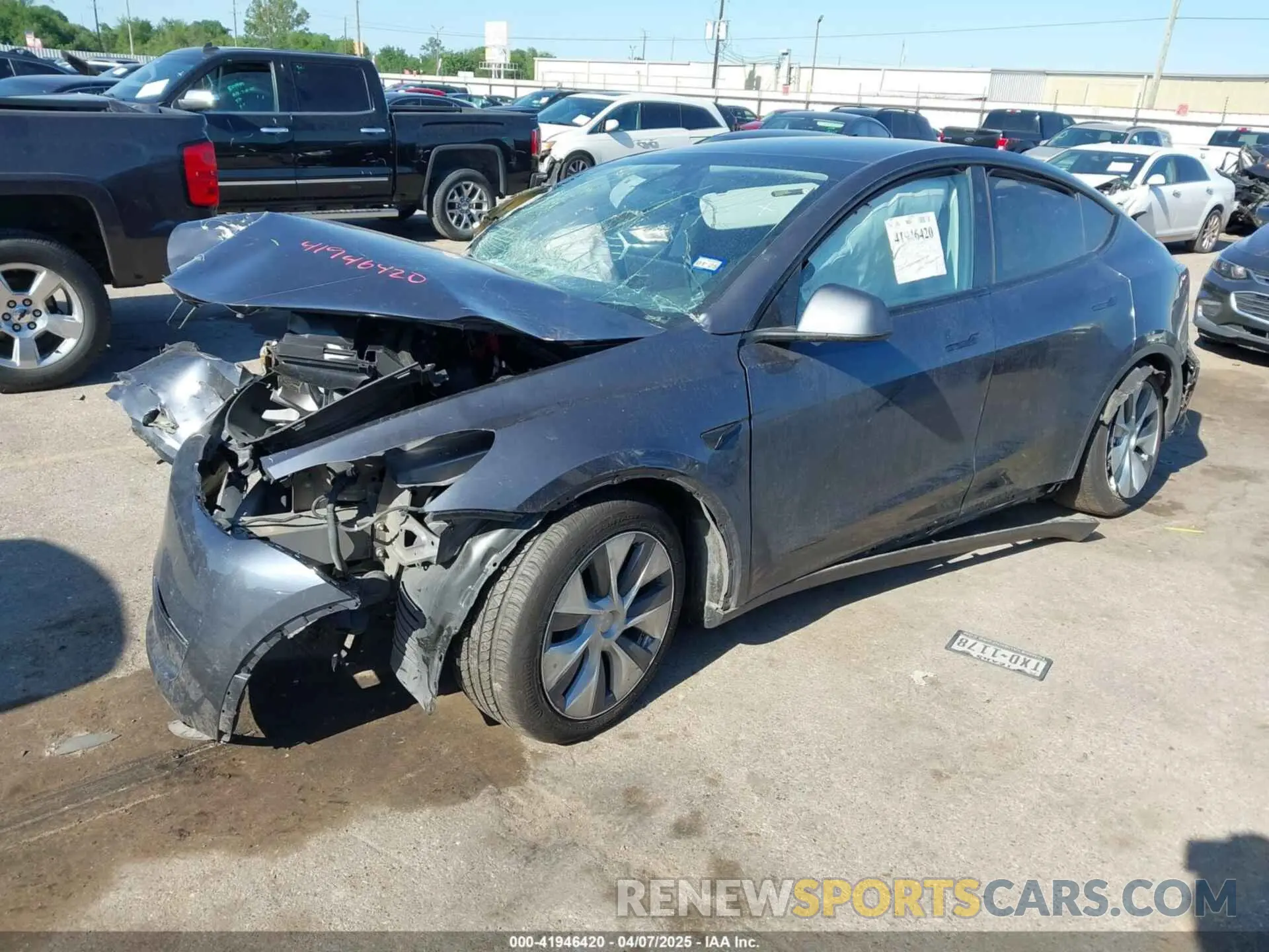2 fotografías del automóvil dañado 7SAYGDEE2PF889117 TESLA MODEL Y 2023