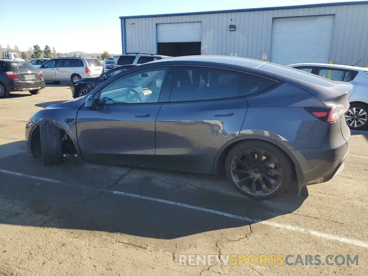 2 fotografías del automóvil dañado 7SAYGDEE2PF914369 TESLA MODEL Y 2023