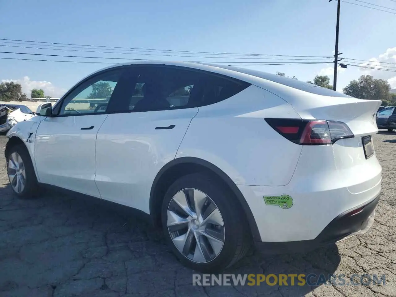 2 fotografías del automóvil dañado 7SAYGDEE3PA108330 TESLA MODEL Y 2023