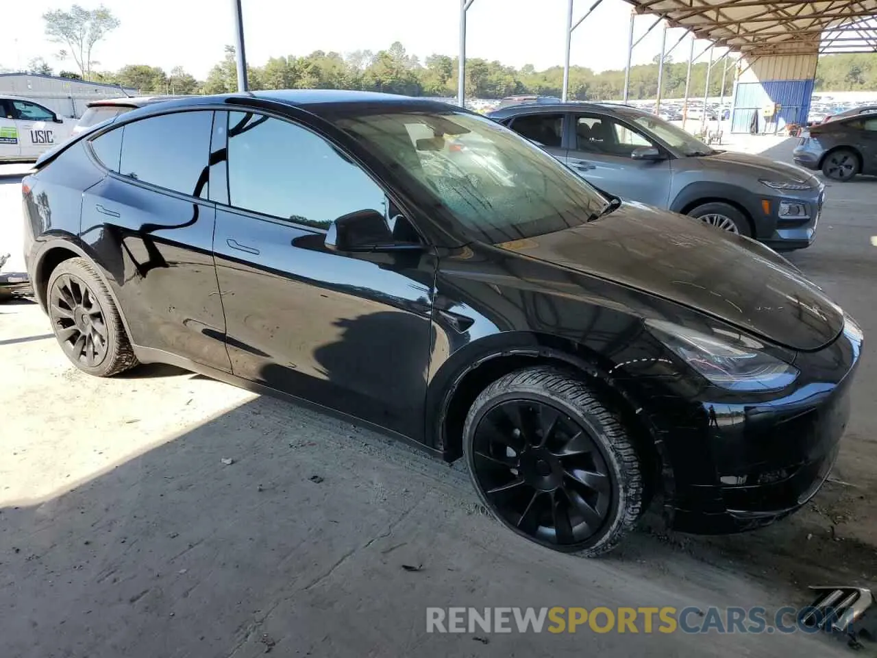 4 fotografías del automóvil dañado 7SAYGDEE3PA110482 TESLA MODEL Y 2023