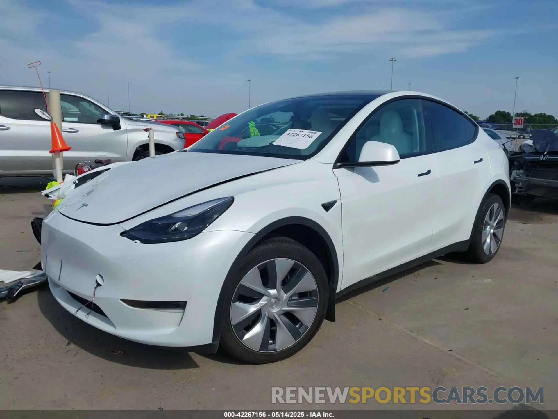 2 fotografías del automóvil dañado 7SAYGDEE3PA166177 TESLA MODEL Y 2023