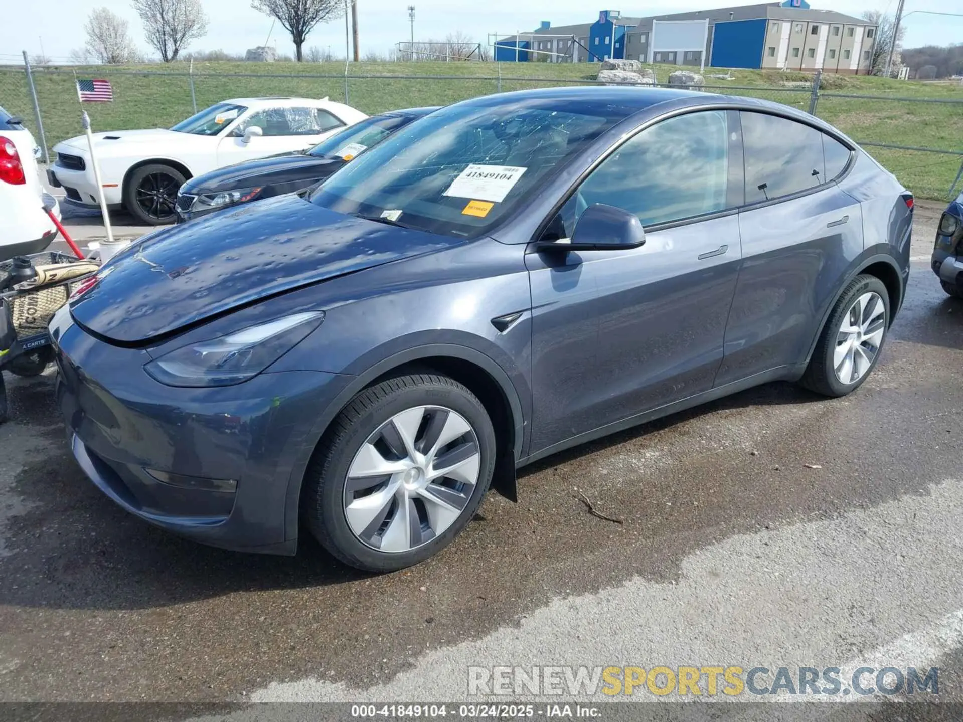 2 fotografías del automóvil dañado 7SAYGDEE3PA204992 TESLA MODEL Y 2023