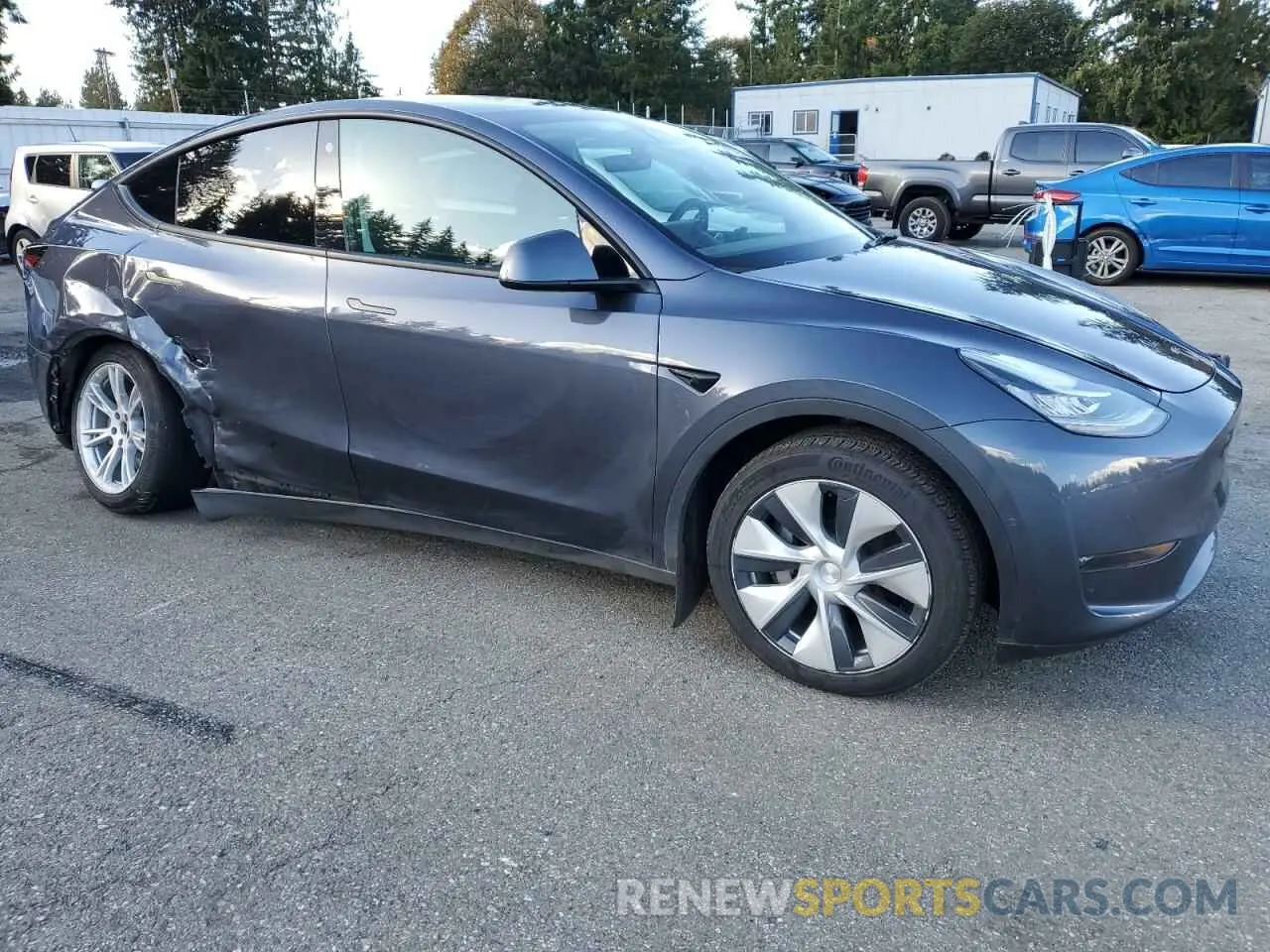 4 fotografías del automóvil dañado 7SAYGDEE3PF592826 TESLA MODEL Y 2023