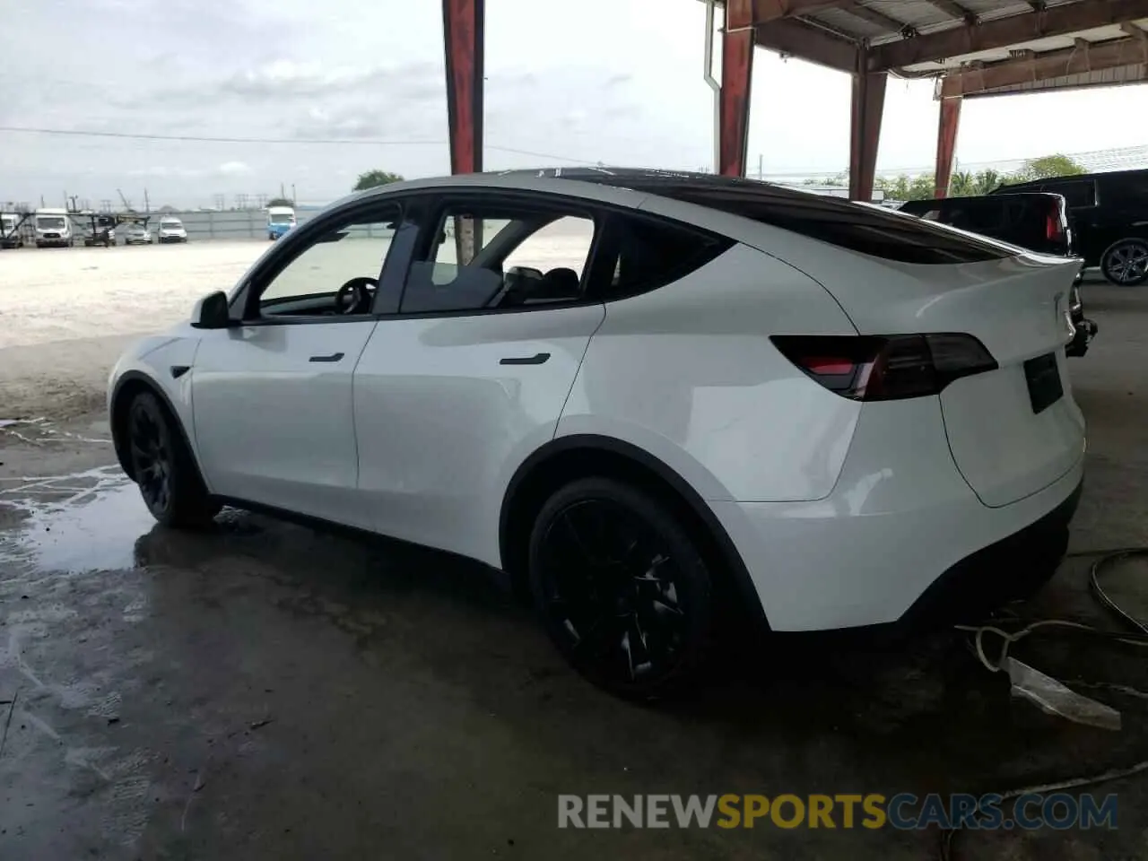 2 fotografías del automóvil dañado 7SAYGDEE3PF597797 TESLA MODEL Y 2023
