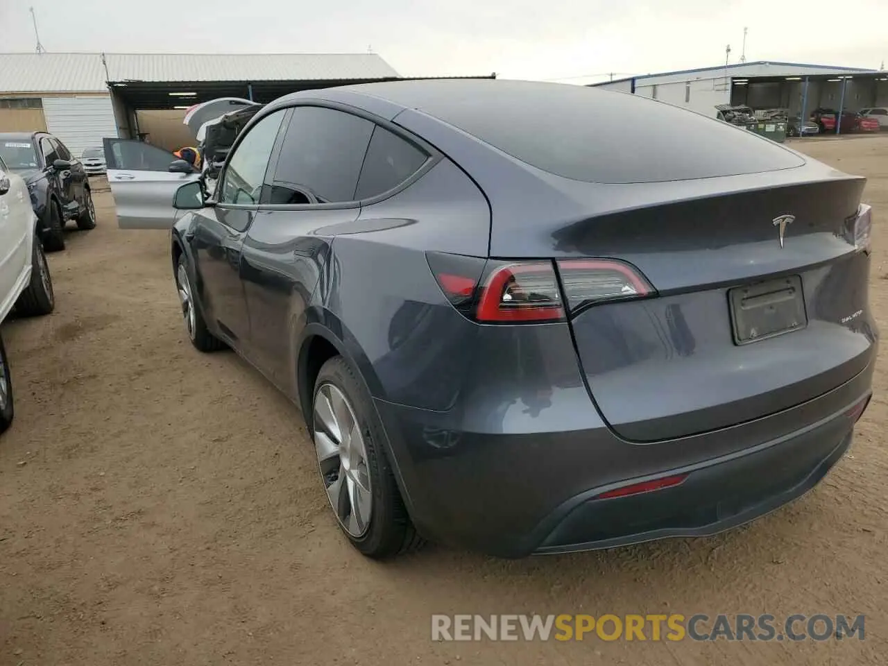2 fotografías del automóvil dañado 7SAYGDEE3PF603615 TESLA MODEL Y 2023