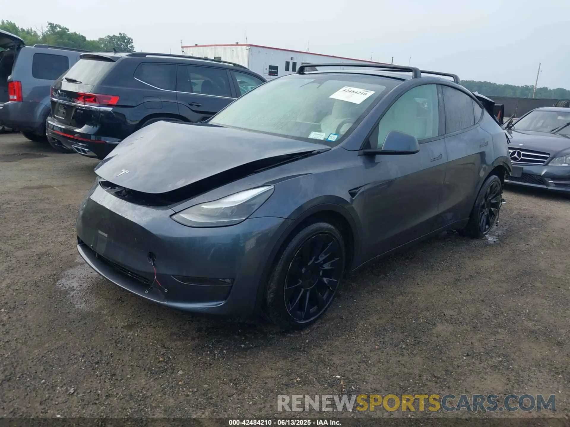 2 fotografías del automóvil dañado 7SAYGDEE3PF631527 TESLA MODEL Y 2023