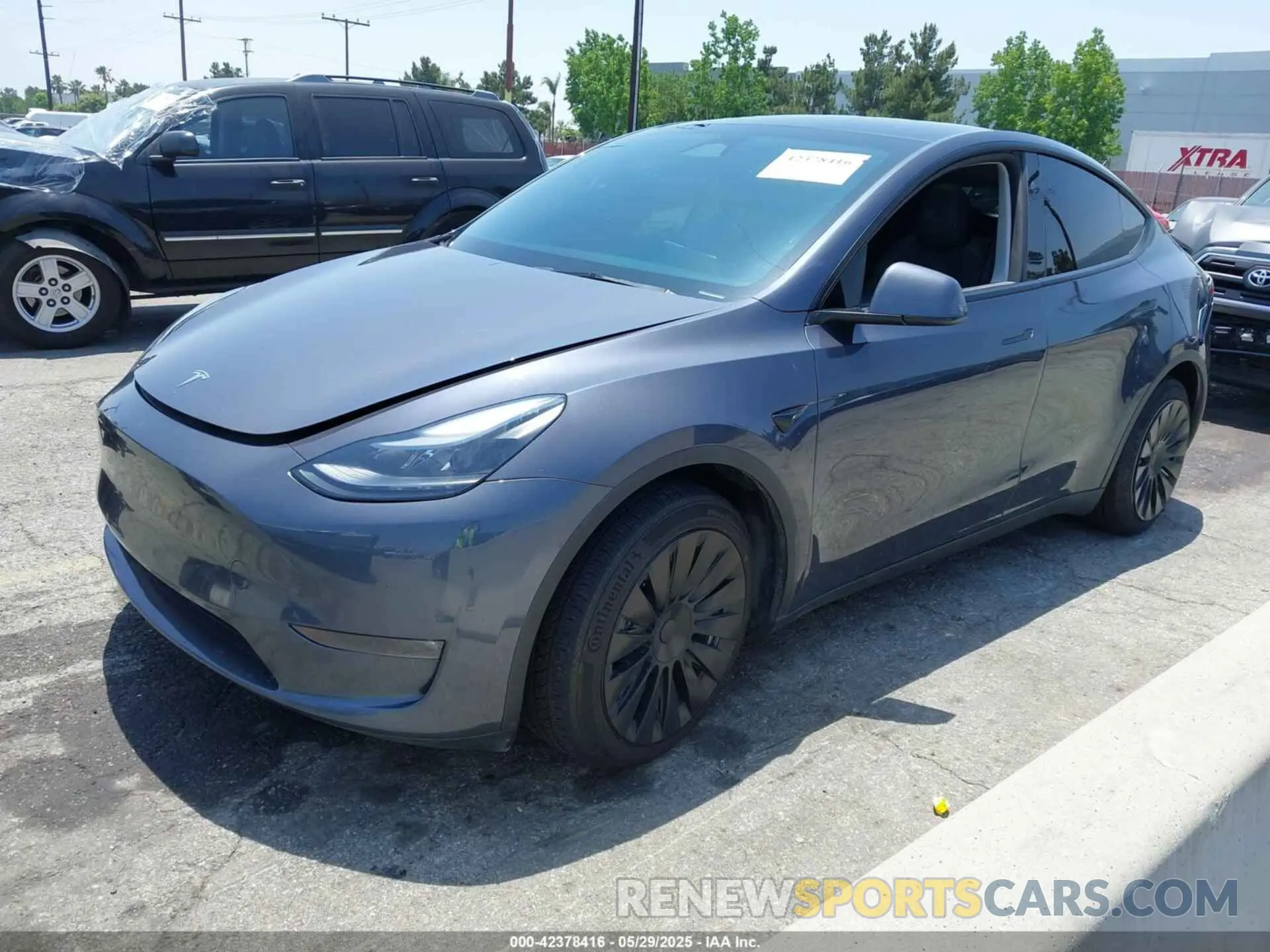 2 fotografías del automóvil dañado 7SAYGDEE3PF806715 TESLA MODEL Y 2023