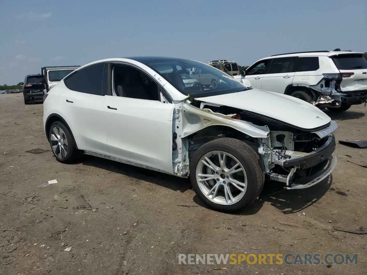 4 fotografías del automóvil dañado 7SAYGDEE3PF828732 TESLA MODEL Y 2023