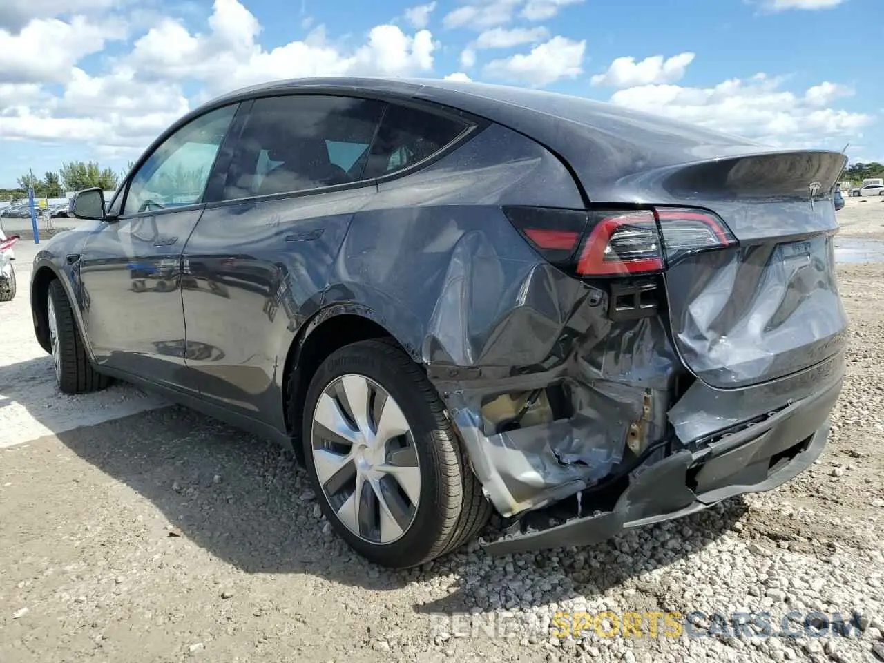 2 fotografías del automóvil dañado 7SAYGDEE3PF865697 TESLA MODEL Y 2023