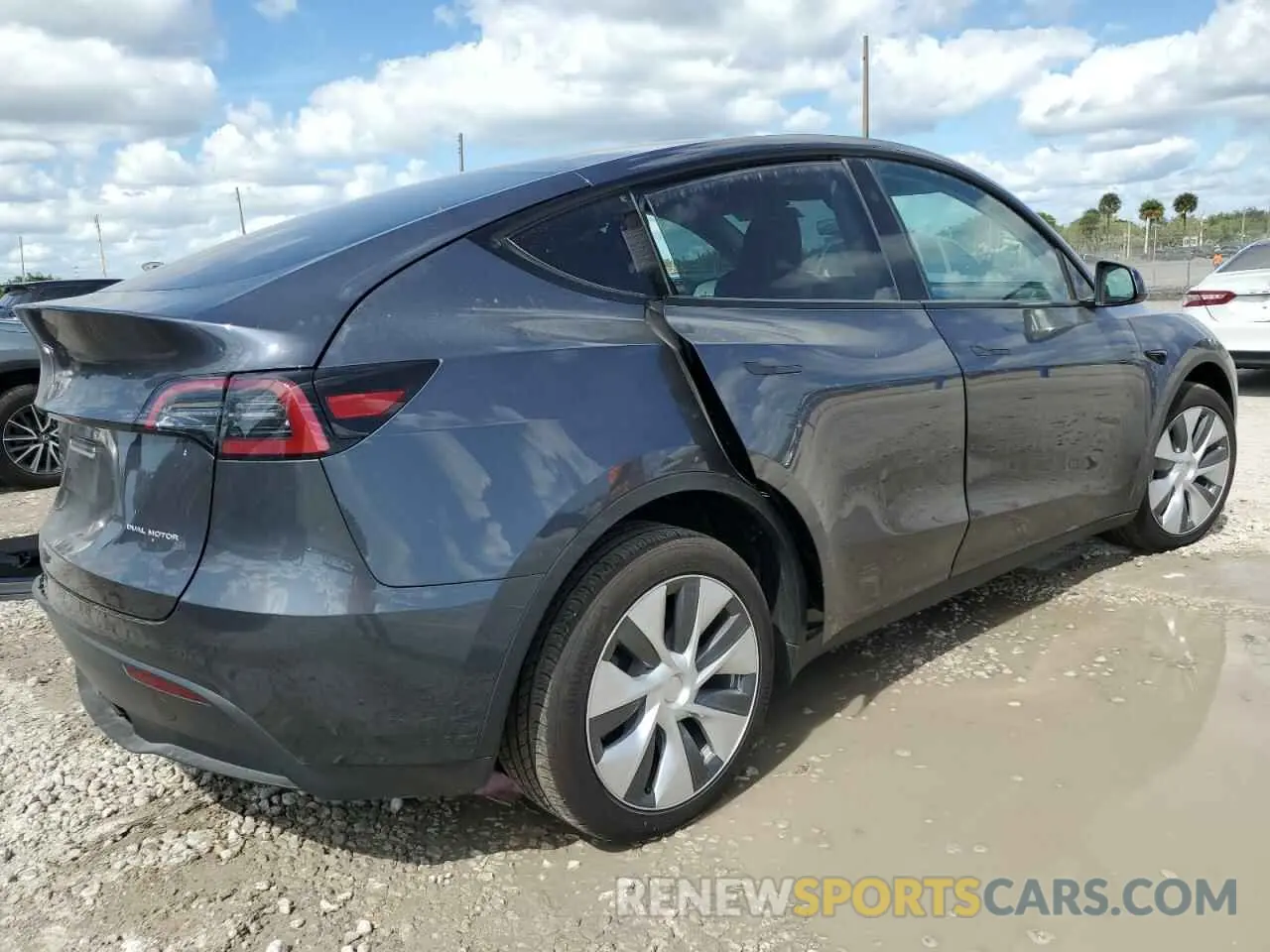 3 fotografías del automóvil dañado 7SAYGDEE3PF865697 TESLA MODEL Y 2023