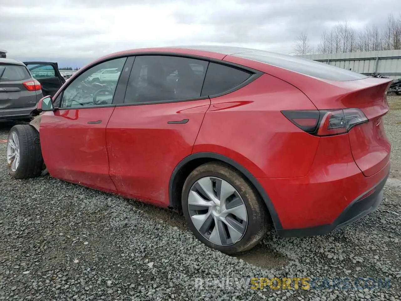 2 fotografías del automóvil dañado 7SAYGDEE3PF938566 TESLA MODEL Y 2023