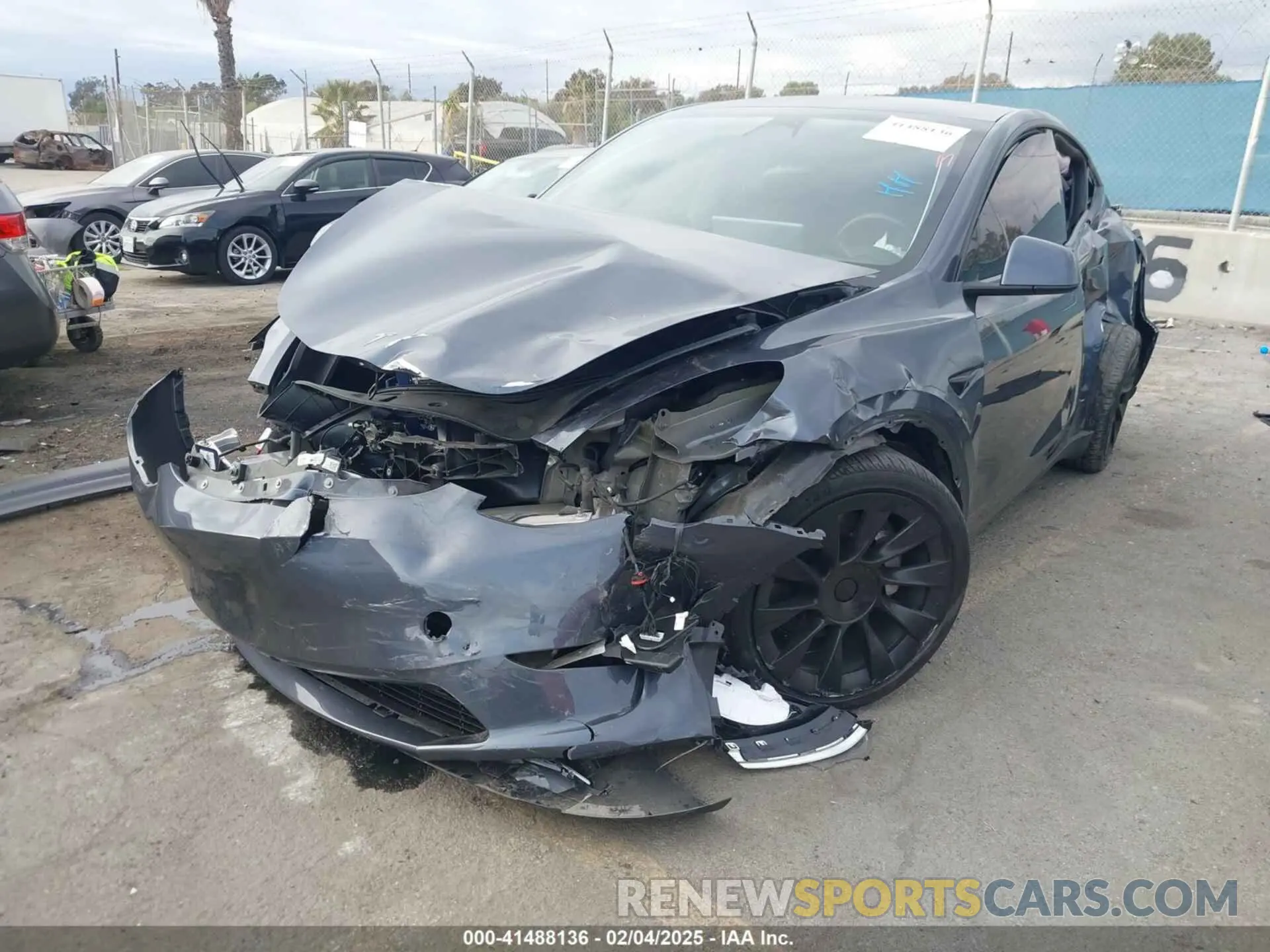 2 fotografías del automóvil dañado 7SAYGDEE4PA028440 TESLA MODEL Y 2023