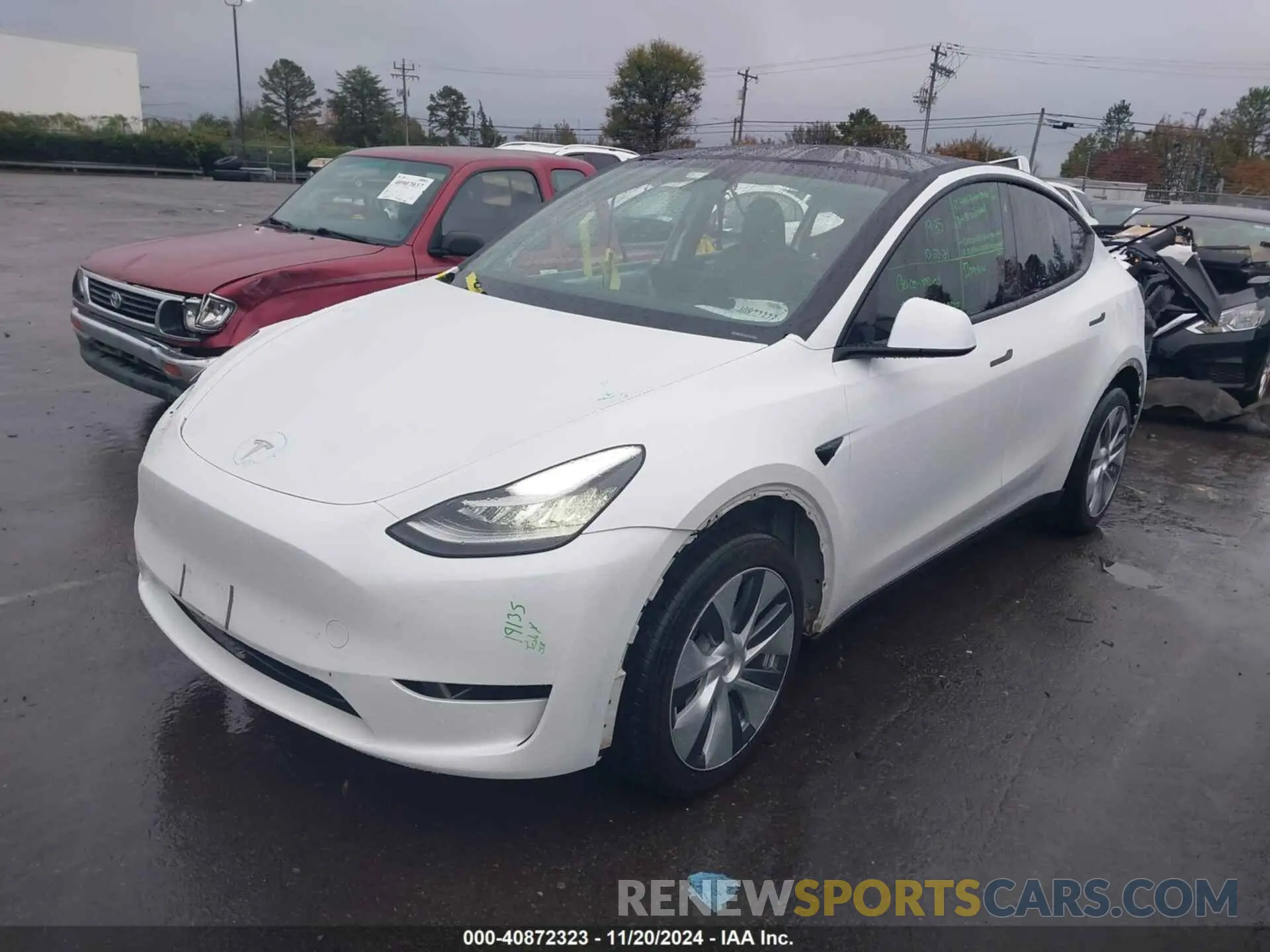 2 fotografías del automóvil dañado 7SAYGDEE4PA078626 TESLA MODEL Y 2023