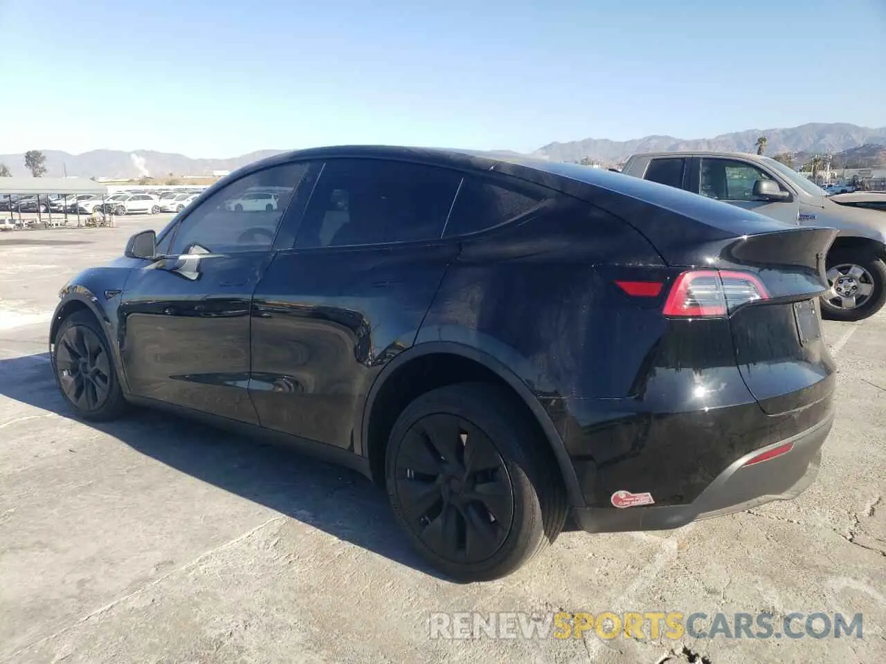 2 fotografías del automóvil dañado 7SAYGDEE4PA097077 TESLA MODEL Y 2023