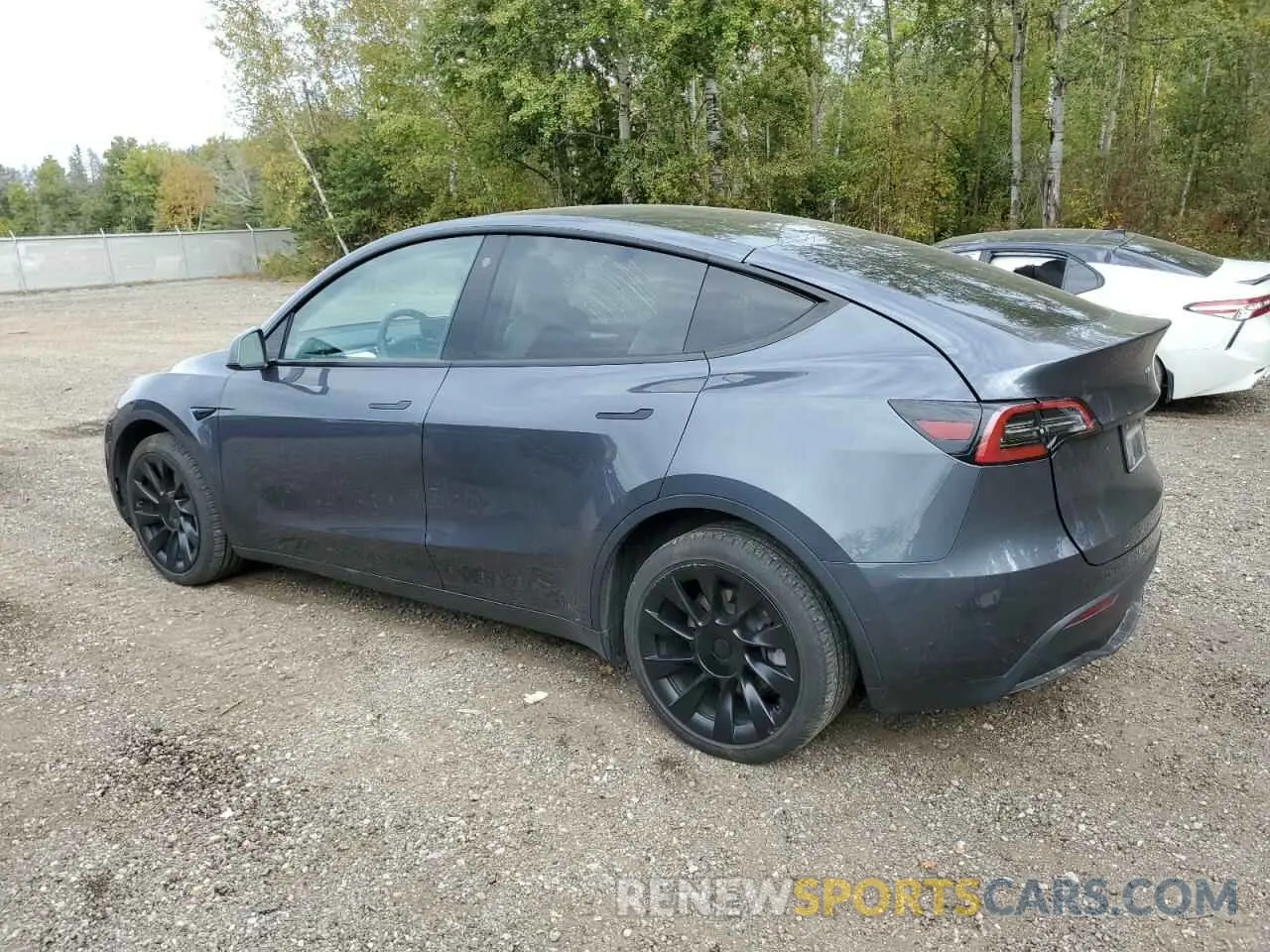 2 fotografías del automóvil dañado 7SAYGDEE4PF609049 TESLA MODEL Y 2023