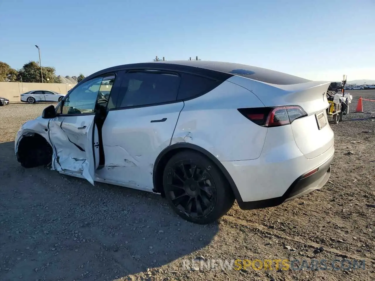 2 fotografías del automóvil dañado 7SAYGDEE4PF612341 TESLA MODEL Y 2023
