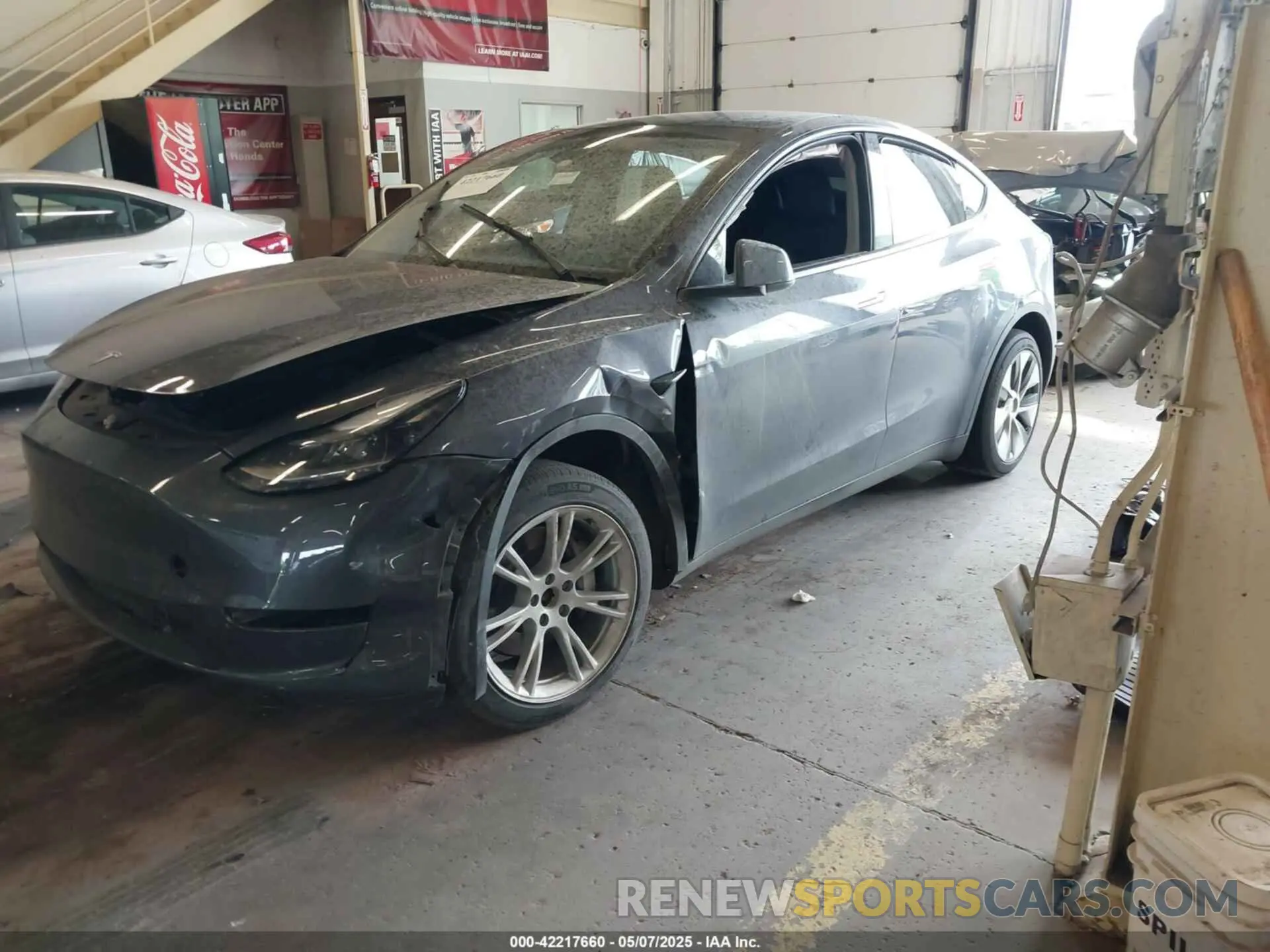 2 fotografías del automóvil dañado 7SAYGDEE4PF806349 TESLA MODEL Y 2023