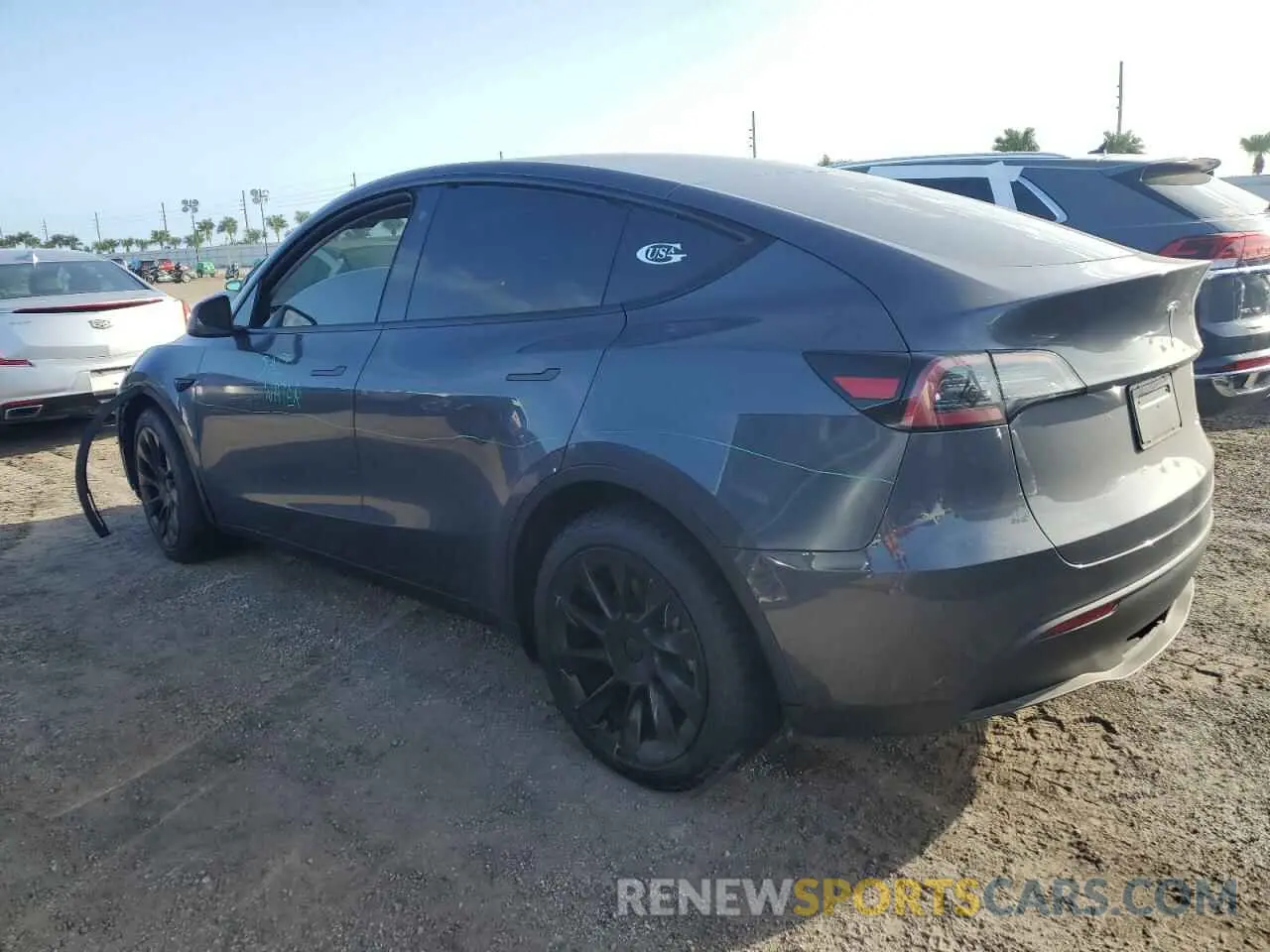 2 fotografías del automóvil dañado 7SAYGDEE5PA057848 TESLA MODEL Y 2023