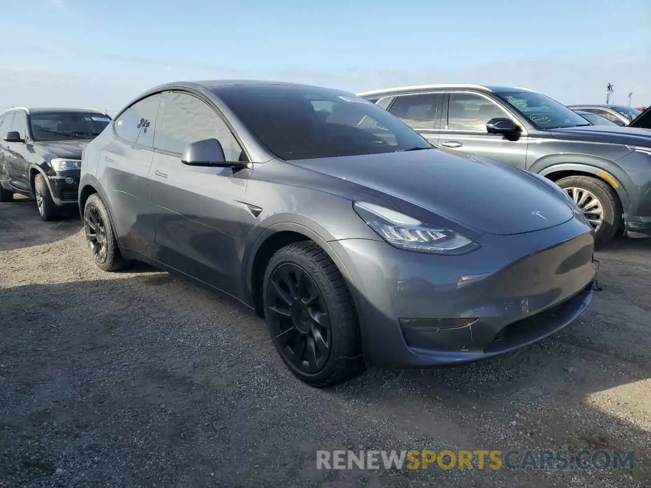 4 fotografías del automóvil dañado 7SAYGDEE5PA057848 TESLA MODEL Y 2023