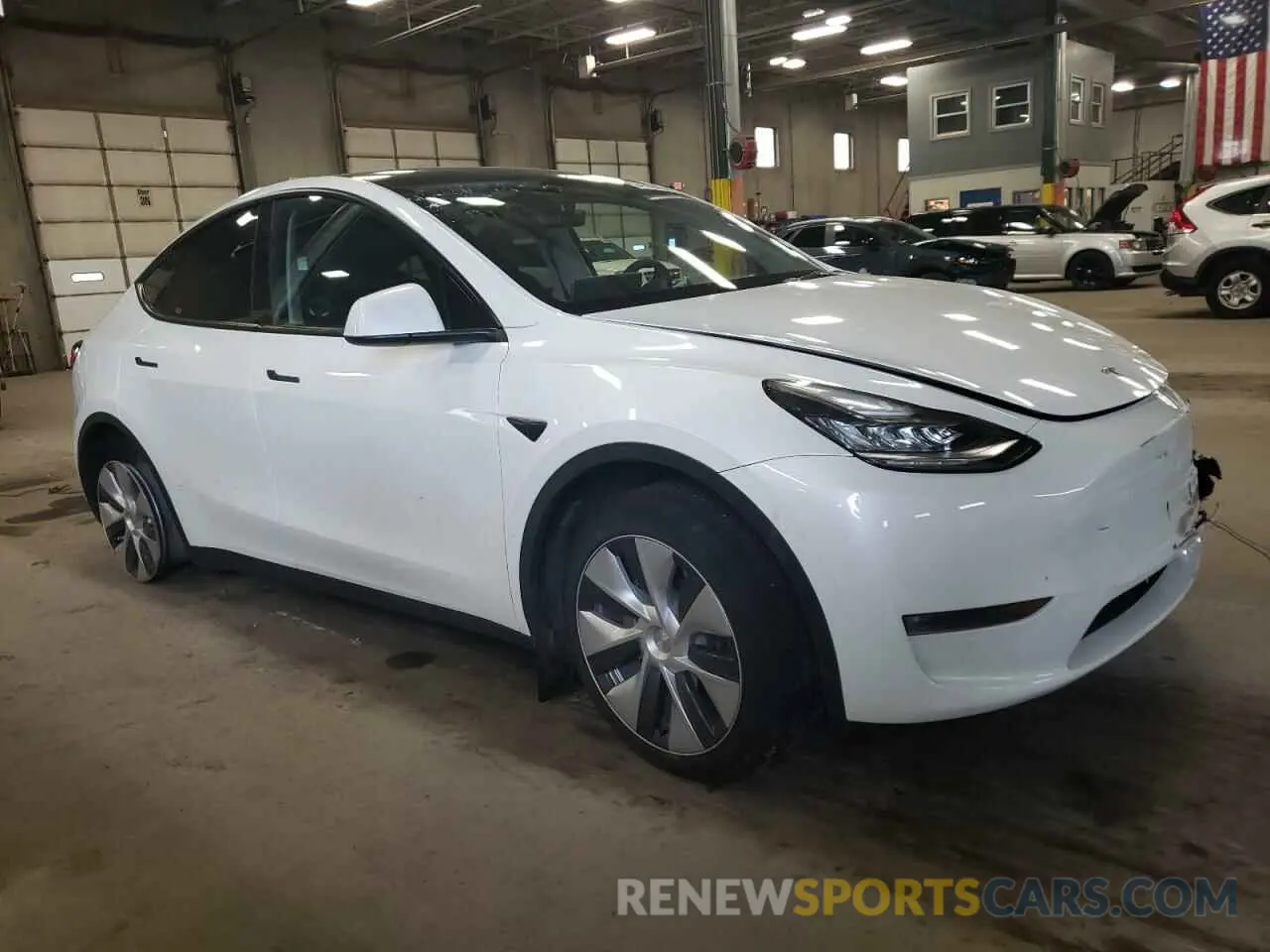 4 fotografías del automóvil dañado 7SAYGDEE5PA067389 TESLA MODEL Y 2023