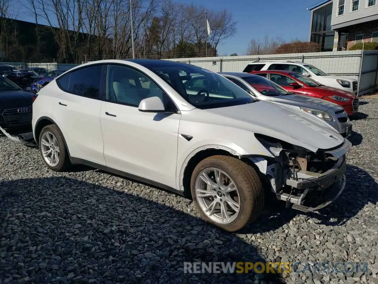 4 fotografías del automóvil dañado 7SAYGDEE5PF671124 TESLA MODEL Y 2023