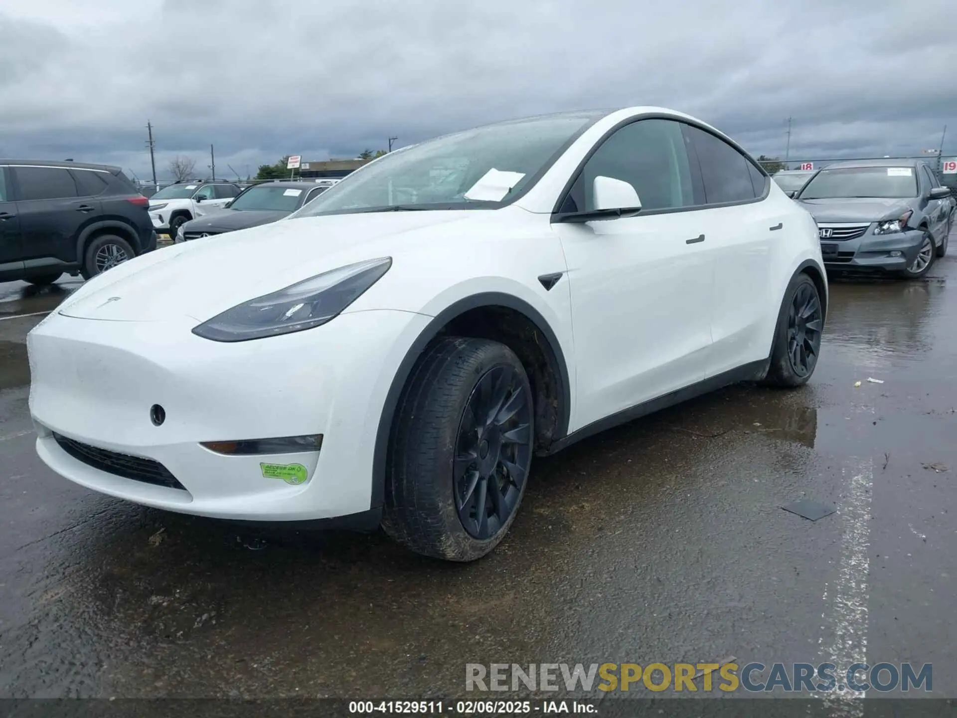 2 fotografías del automóvil dañado 7SAYGDEE5PF753922 TESLA MODEL Y 2023