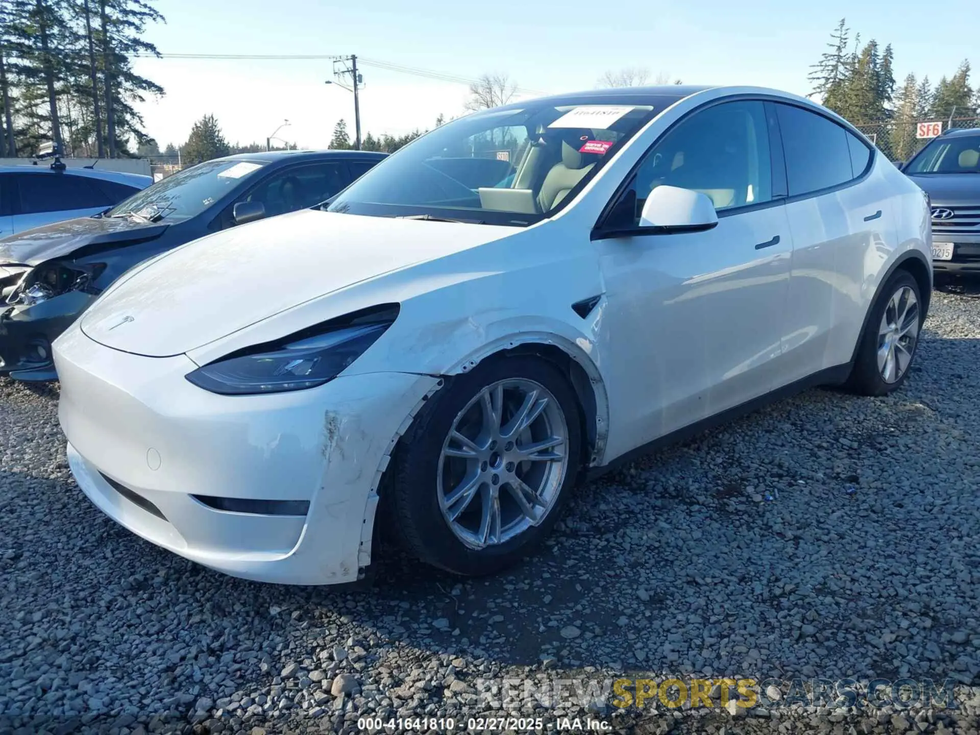 2 fotografías del automóvil dañado 7SAYGDEE5PF787651 TESLA MODEL Y 2023