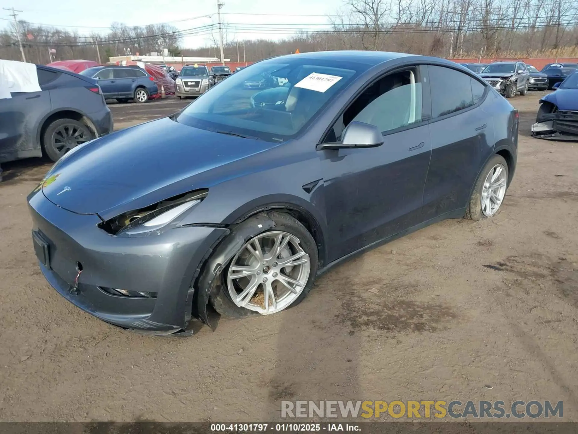 2 fotografías del automóvil dañado 7SAYGDEE5PF801998 TESLA MODEL Y 2023