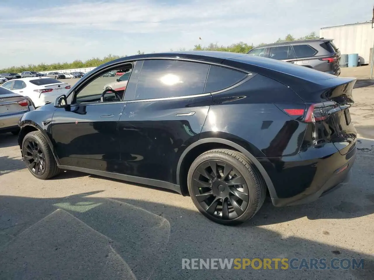 2 fotografías del automóvil dañado 7SAYGDEE5PF834645 TESLA MODEL Y 2023
